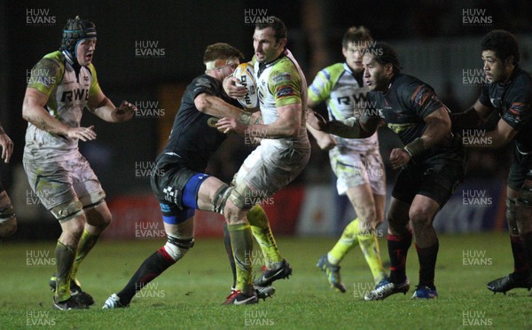 311212 - Newport Gwent Dragons v Ospreys, RaboDirect PRO12 -Ospreys Joe Bearman is tackled by Dragons Andrew Coombs   