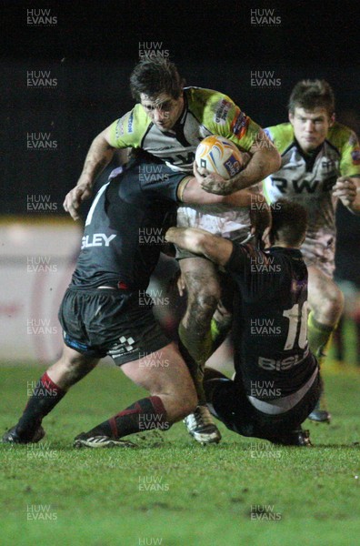 311212 - Newport Gwent Dragons v Ospreys, RaboDirect PRO12 -Ospreys Andrew Bishop is tackled 