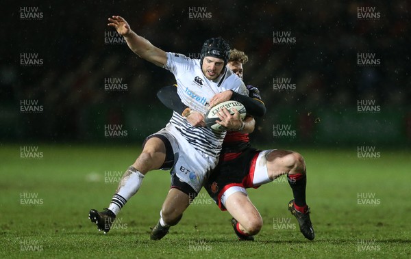 311217 - Dragons v Ospreys - Guinness PRO14 - Dan Evans of Ospreys is tackled by Angus O'Brien of Dragons