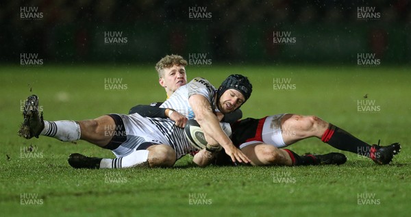 311217 - Dragons v Ospreys - Guinness PRO14 - Dan Evans of Ospreys is tackled by Angus O'Brien of Dragons