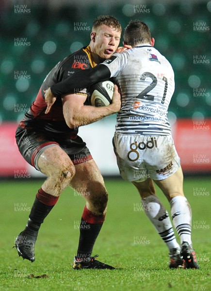 311217- Dragons v Ospreys - Guinness PRO14 -  Dragons Jack Dixon is tackled by Tom Habberfield