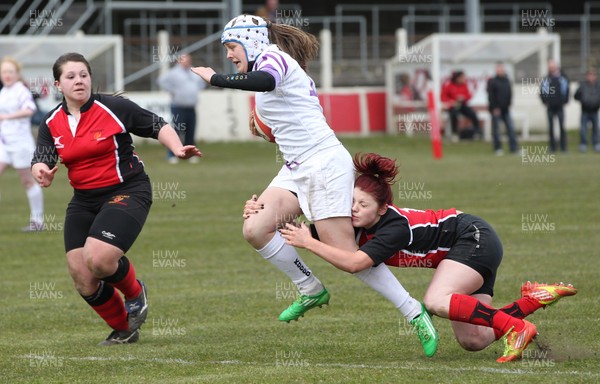 070413 - Dragons u18 Women v Ospreys u18 Women, Cross Keys - Ospreys Hannah Jones is tackled just short of the line 