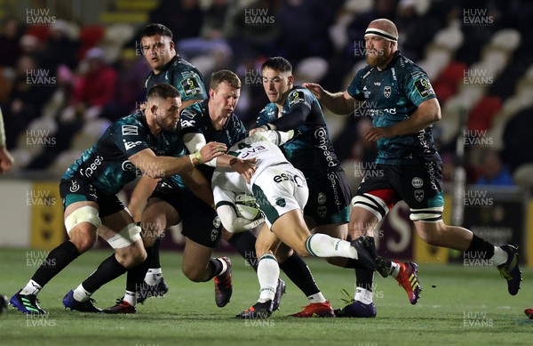 171222 - Dragons v Pau - EPCR Challenge Cup - Thomas Carol of Pau is tackled by Harri Keddie, Jack Dixon and Sam Davies of Dragons