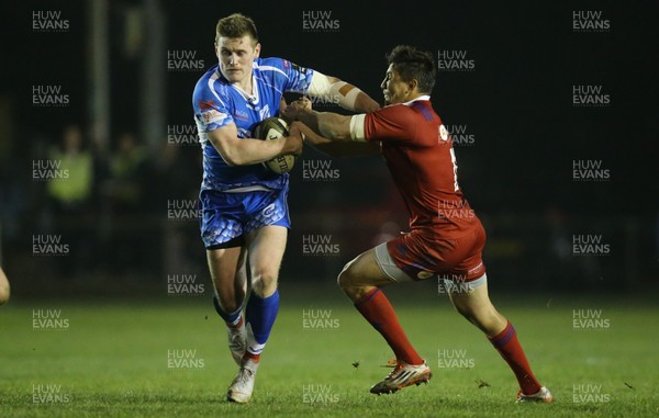 161118 - Dragons v Russia Rugby, International Friendly - Dafydd Howells of Dragons holds off Mikhail Babaev of Russia