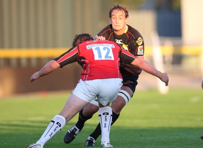 22.08.08...Newport Gwent Dragons v Saracens, pre-season friendly Draons James Harris takes on Saracens Adam powell 