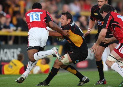 22.08.08...Newport Gwent Dragons v Saracens, pre-season friendly Dragons Joe Bearman takes on Saracens Kameli Ratuvou 