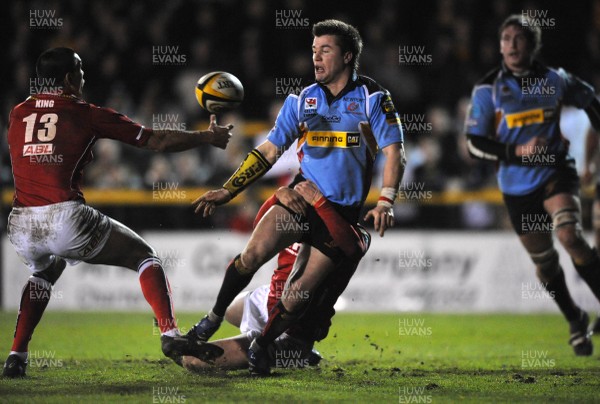 01.01.08 - Newport-Gwent Dragons v Llanelli Scarlets - Magners League - Dragons Ceri Sweeney is tackled by Rhys Pristland 