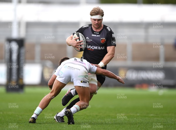 160521 - Dragons v Ospreys - Guinness PRO14 Rainbow Cup - Aaron Wainwright of Dragons is tackled by Dewi Cross of Ospreys