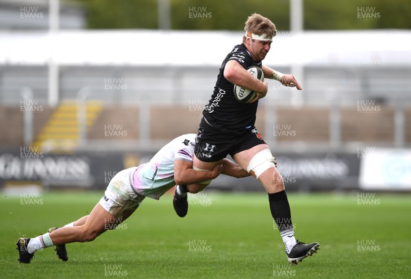 160521 - Dragons v Ospreys - Guinness PRO14 Rainbow Cup - Aaron Wainwright of Dragons is tackled by Dewi Cross of Ospreys