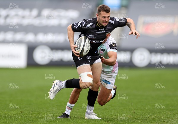 160521 - Dragons v Ospreys - Guinness PRO14 Rainbow Cup - Josh Lewis of Dragons is tackled by Owen Watkin of Ospreys