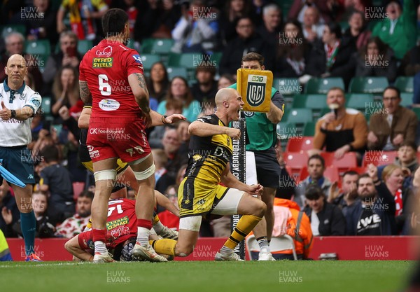 190425 - Dragons v Scarlets - Judgement Day X - United Rugby Championship - Jared Rosser of Dragons celebrates scoring a try with team mates