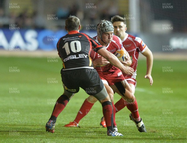 200913 - Dragons v Scarlets - RaboDirect PRO12Jonathan Davies of Scarlets is tackled by Jason Tovey of Dragons(c) Huw Evans Picture Agency