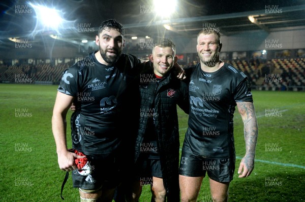 211219 - Dragons v Scarlets - Guinness PRO14 - Cory Hill, Elliot Dee and Ross Moriarty of Dragons at the end of the game