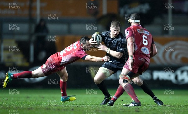 211219 - Dragons v Scarlets - Guinness PRO14 - Aaron Wainwright of Dragons is tackled by Ryan Lamb of Scarlets