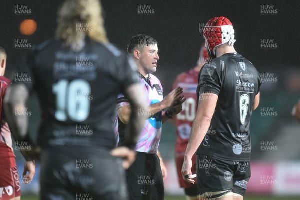 211219 - Dragons v Scarlets - Guinness Pro 14 - Referee Ben Whitehouse talks to Cory Hill of Dragons