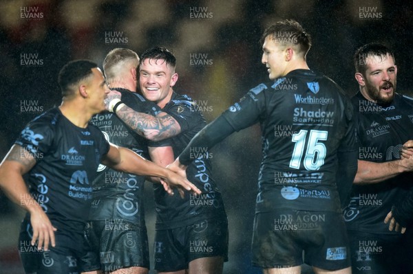 211219 - Dragons v Scarlets - Guinness Pro 14 - Dragons players celebrate their last second win
