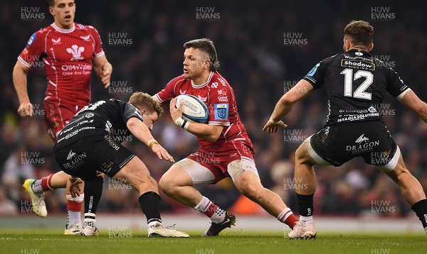 220423 - Dragons v Scarlets - United Rugby Championship - Steff Evans of Scarlets gets into space