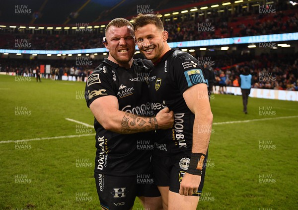 220423 - Dragons v Scarlets - United Rugby Championship - Lloyd Fairbrother and Elliot Dee of Dragons celebrate at the end of the game
