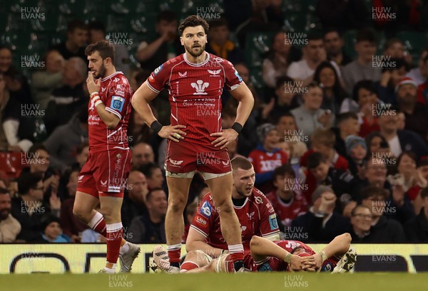 220423 - Dragons v Scarlets - United Rugby Championship - Judgement Day - Dejected Johnny Williams of Scarlets at full time
