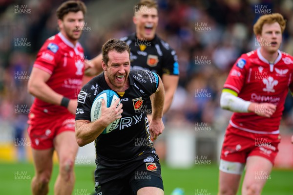 230422 - Dragons v Scarlets - United Rugby Championship - Adam Warren of Dragons celebrates his try