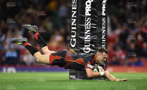 270419 - Dragons v Scarlets - Guinness PRO14 - Judgement Day - Josh Lewis of Dragons score try