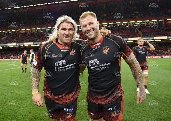 270419 - Dragons v Scarlets - Guinness PRO14 - Judgement Day - Richard Hibbard and Ross Moriarty of Dragons celebrate at the end of the game