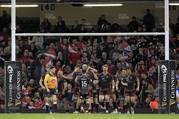 270419 - Dragons v Scarlets, Judgement Day VII, Guinness PRO14 - Dragons celebrate scoring their third try scored by Josh Lewis