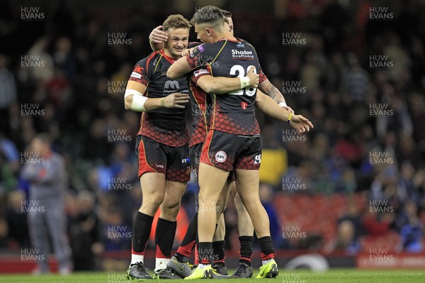 270419 - Dragons v Scarlets, Judgement Day VII, Guinness PRO14 - Dragons players celebrate at the final whistle
