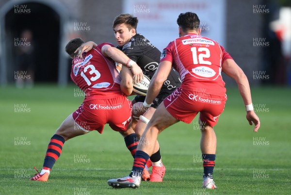 290820 - Dragons v Scarlets - Guinness PRO14 - Taine Basham of Dragons is tackled by Steff Hughes of Scarlets
