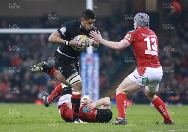 300313 Newport Gwent Dragons v Scarlets - RaboDirectPro12 -Dragons' Toby faletau Scarlets' Jonathan Edwards and Jonathan Davies(13)