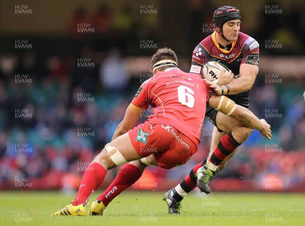 300416 - Newport Gwent Dragons v Scarlets, Judgement Day IV, Guinness PRO12 - Adam Hughes of Newport Gwent Dragons takes on Lewis Rawlins of Scarlets