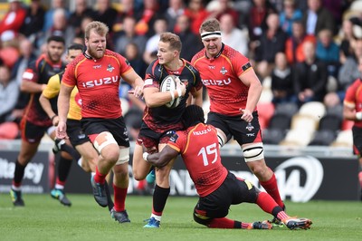 080918 - Dragons v Southern Kings - Guinness PRO14 - Hallam Amos of Dragons is tackled by Yaw Penxe of Southern Kings