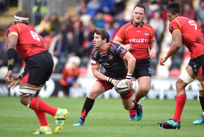 080918 - Dragons v Southern Kings - Guinness PRO14 - Rhodri Williams of Dragons gets the ball away