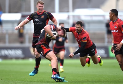 080918 - Dragons v Southern Kings - Guinness PRO14 - Tyler Morgan of Dragons is tackled by Bjorn Basson of Southern Kings