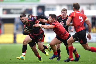 080918 - Dragons v Southern Kings - Guinness PRO14 - Jordan Williams of Dragons tries to get past Michael Willemse of Southern Kings