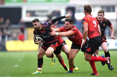 080918 - Dragons v Southern Kings - Guinness PRO14 - Jordan Williams of Dragons tries to get past Michael Willemse of Southern Kings