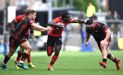 080918 - Dragons v Southern Kings - Guinness PRO14 - Yaw Penxe of Southern Kings gets past Hallam Amos and Ryan Bevington of Dragons