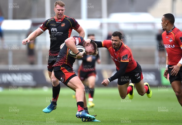 080918 - Dragons v Southern Kings - Guinness PRO14 - Tyler Morgan of Dragons is tackled by Bjorn Basson of Southern Kings