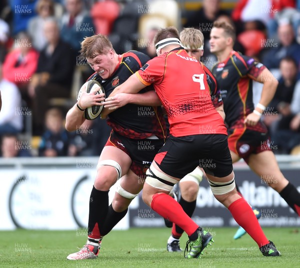 080918 - Dragons v Southern Kings - Guinness PRO14 - Matthew Screech of Dragons is tackled by Schalk Oelofse of Southern Kings