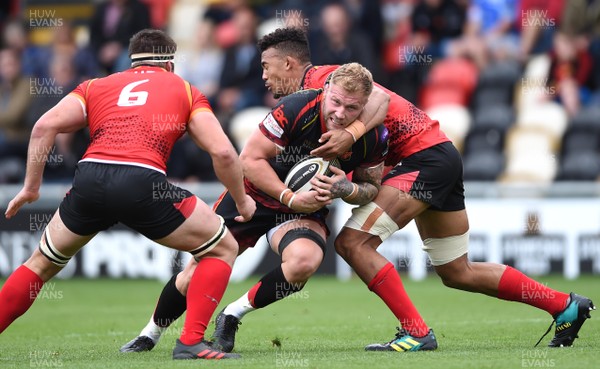 080918 - Dragons v Southern Kings - Guinness PRO14 - Ross Moriarty of Dragons is tackled by Stephan De Wit of Southern Kings