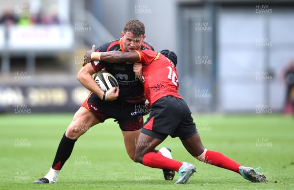 080918 - Dragons v Southern Kings - Guinness PRO14 - Elliot Dee of Dragons is tackled by Masixole Banda of Southern Kings