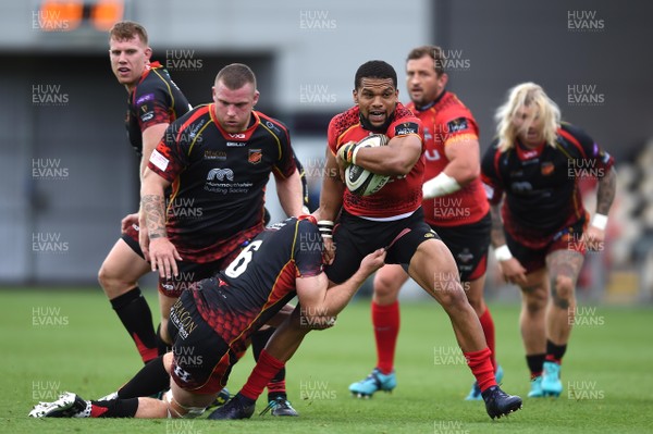 080918 - Dragons v Southern Kings - Guinness PRO14 - Berton Klassen of Southern Kings is tackled by Aaron Wainwright of Dragons