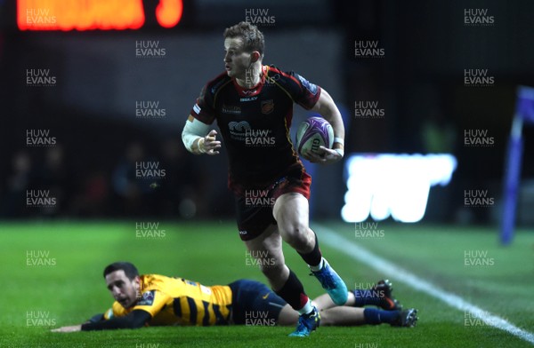 110119 - Dragons v Timisoara Saracens - European Rugby Challenge Cup - Hallam Amos of Dragons is tackled by Stephen Shennan of Timisoara Saracens