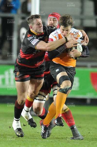 230318 - Dragons v Toyota Cheetahs - Guinness PRO14 - William Small-Smith of Toyota Cheetahs is tackled by Elliot Dee of Dragons
