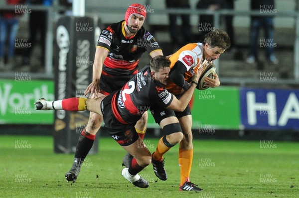 230318 - Dragons v Toyota Cheetahs - Guinness PRO14 - William Small-Smith of Toyota Cheetahs is tackled by Elliot Dee of Dragons
