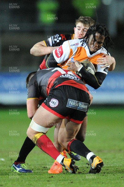 230318 - Dragons v Toyota Cheetahs - Guinness PRO14 - Sibahle Maxwane of Toyota Cheetahs is tackled by Connor Edwards of Dragons