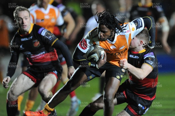 230318 - Dragons v Toyota Cheetahs - Guinness PRO14 - Sibahle Maxwane of Toyota Cheetahs is tackled by Arwel Robson of Dragons