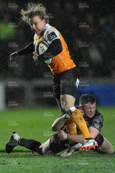 230318 - Dragons v Toyota Cheetahs - Guinness PRO14 - Fred Zeilinga of Toyota Cheetahs is tackled by Elliot Dee of Dragons