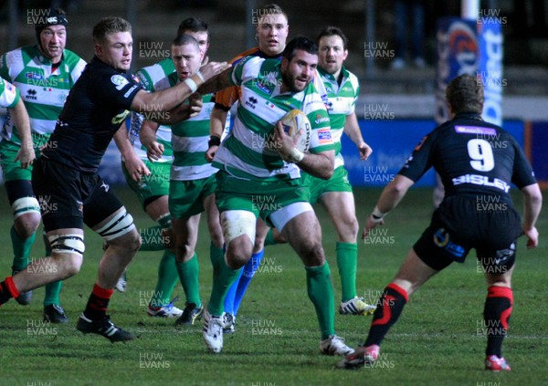 080213 Newport Gwent Dragons v Treviso - RaboDirectPro12 -Treviso's Robert Barbieri fends off Dragons' Lewis Jones 