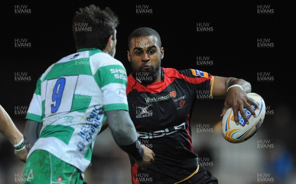 130412 - Newport-Gwent Dragons v Benetton Treviso - RaboDirect PRO12 -Aled Brew of Newport-Gwent Dragons takes on Edoardo Gori of Benetton Treviso